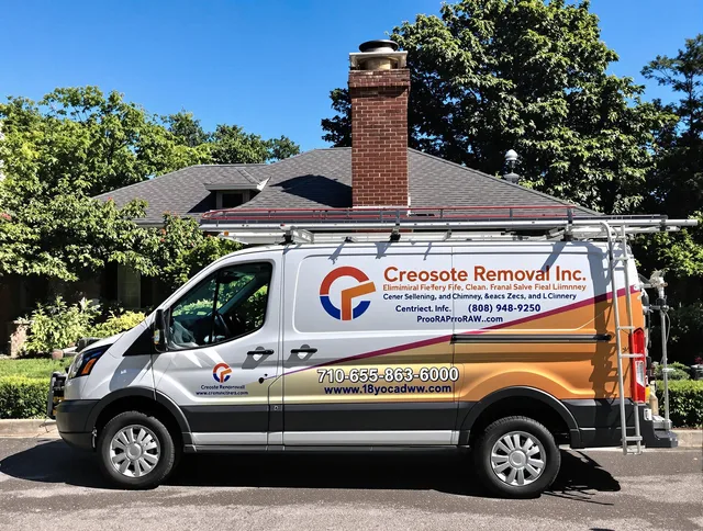 Port Charlotte Chimney Sweep technician removing creosote safely in Port Charlotte, FL