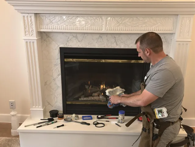 Port Charlotte Chimney Sweep performing fireplace maintenance in Port Charlotte, FL